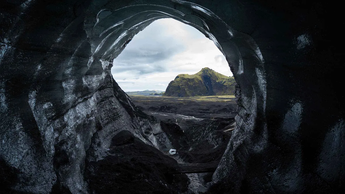 Private 4x4 on the black sand track to the Katla ice cave under Mýrdalsjökull on a private Katla ice cave tour from Vík, Iceland